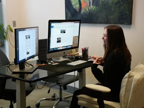 Kelsey at her desk